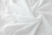 Ткань шитье белого цвета с крупными цветами