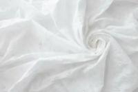 Ткань белое шитье с цветами и ромбами