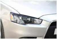 Накладки на передние фары (реснички) Mitsubishi Lancer X 2007-2010