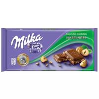 Шоколад Milka Haselnuss молочный c дробленым фундуком