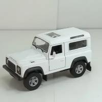 Металлическая машинка 1:34-1:39 LAND ROVER DEFENDER, белый 42392D Welly