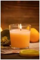 Ароматическая свеча в стакане с ароматом апельсин и имбирь