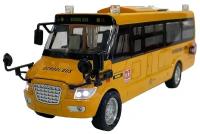 Металлическая модель школьного автобуса 23 см, School Bus свет-звук, двери открываются, масштаб 1/18 18091